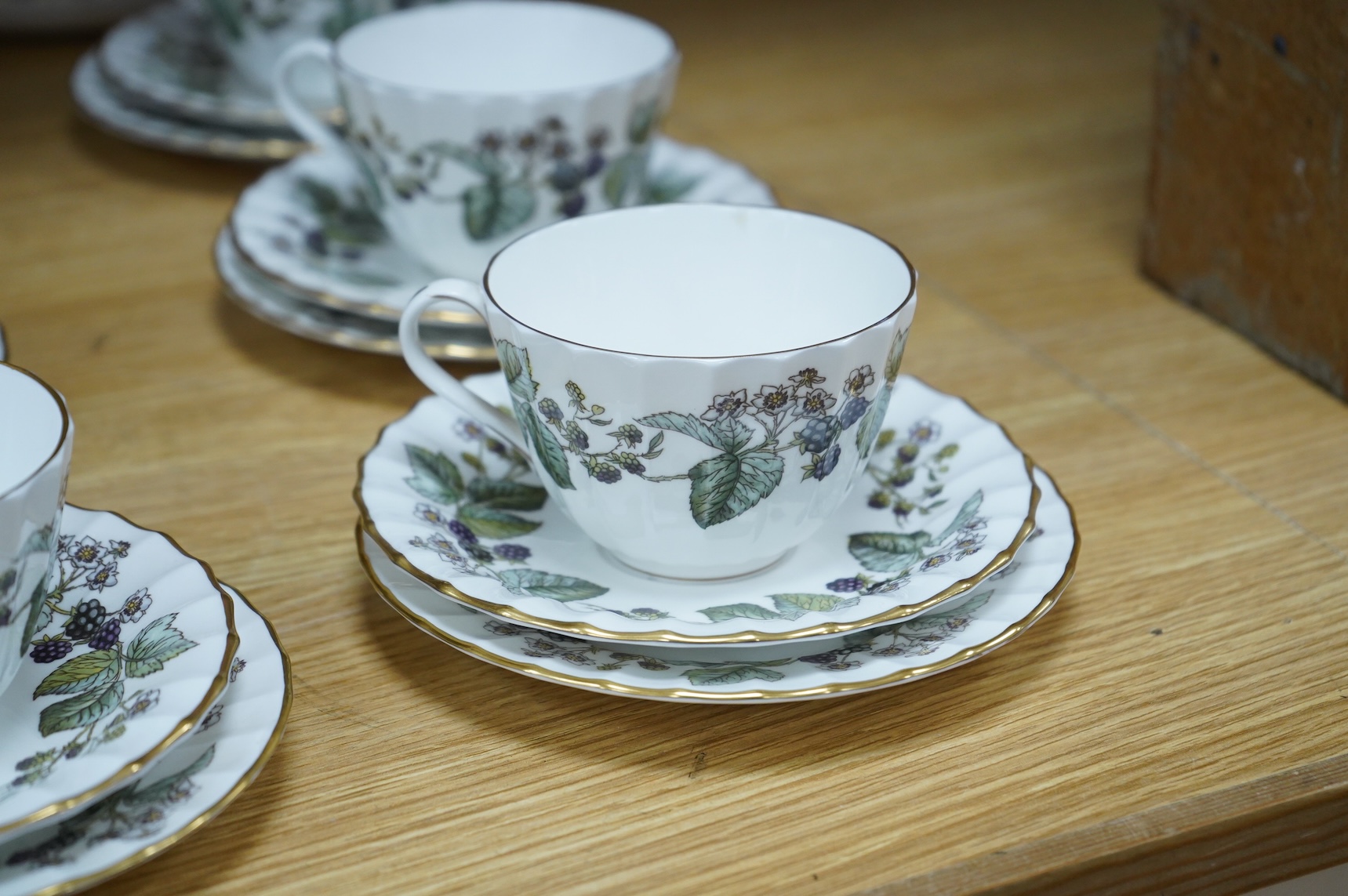 A Royal Crown Derby tea for two set, and a Royal Worcester Lavinia pattern part tea set to include trios, largest 20cm wide